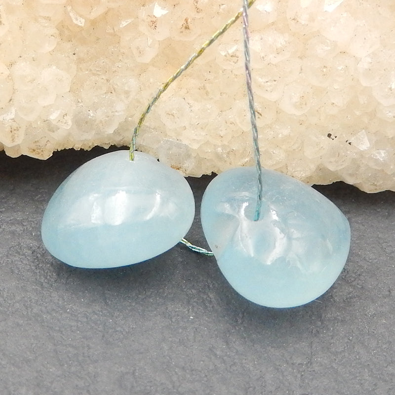 蓝色海蓝宝石刻面宝石凸圆形一对，21x15 毫米，12.1 克
